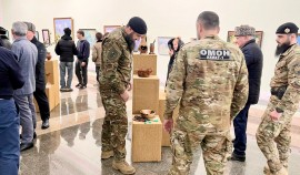 Росгвардейцы посетили выставку, приуроченную к 23-летию Конституции Чеченской Республики| грозный, чгтрк